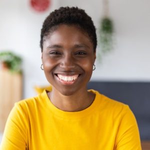 portrait-screen-view-of-smiling-millennial-african-woman-on-video-call-at-home-e1655156238810.jpg portrait-screen-view-of-smiling-millennial-african-woman-on-video-call-at-home-e1655156238810.jpg